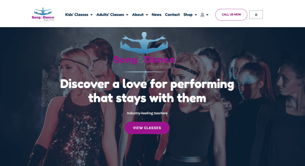 a group of women in black dresses